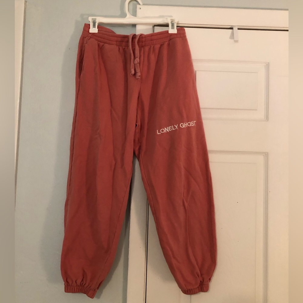 Lonley ghost coral sweatpants. Size medium. Side pockets and one back pocket.